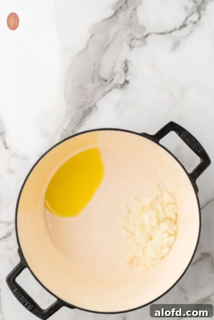 Chicken Taco Soup Delight 5 Sautéing onions in olive oil