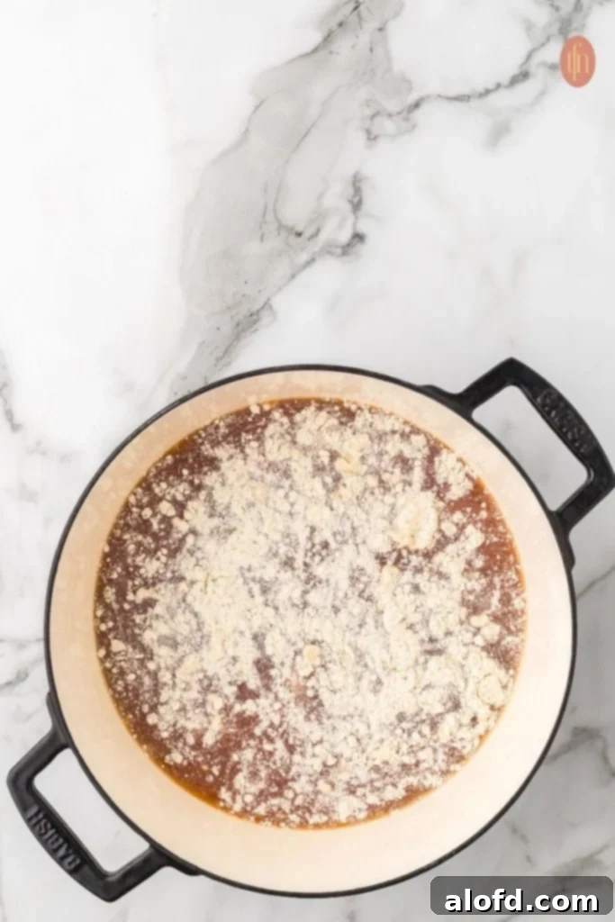 Chicken Taco Soup Delight 9 Sprinkling ranch seasoning