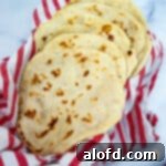 Sourdough flatbread on a red kitchen towel.