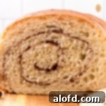 Sliced bread on a wooden board.